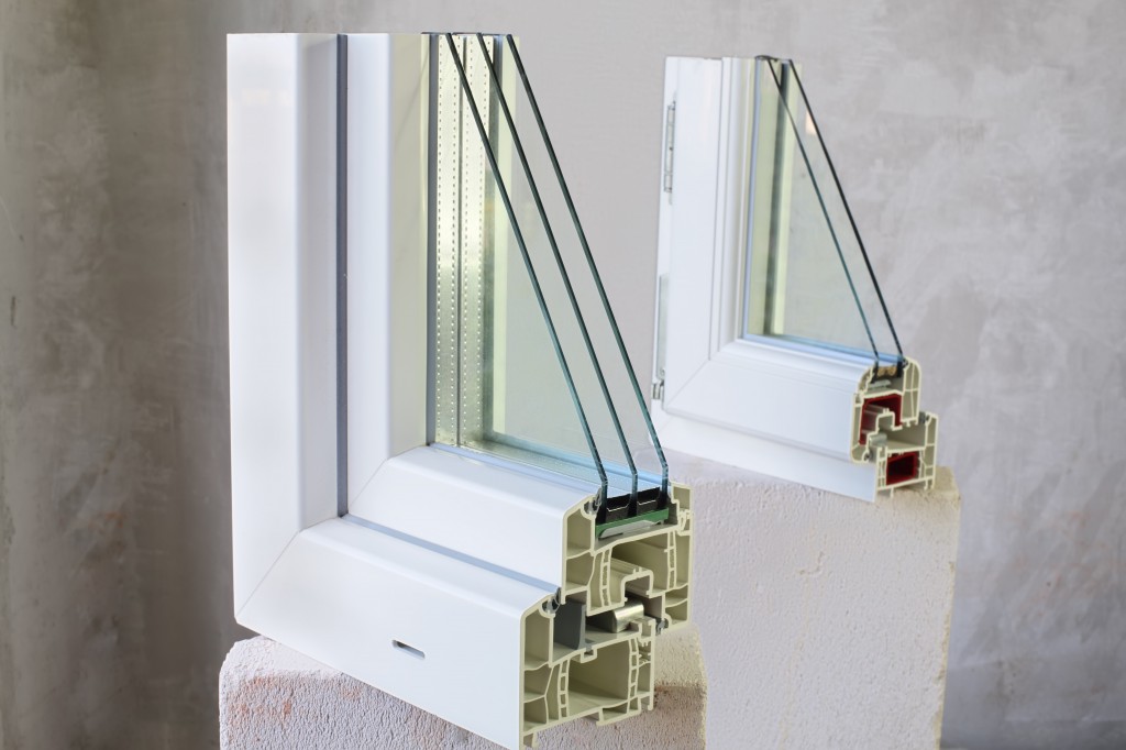 Two sample of PVC windows stands on concrete block